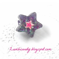 Adjustable sparkly purple star ring