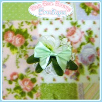 Cute Little Green Bow with White Flowers