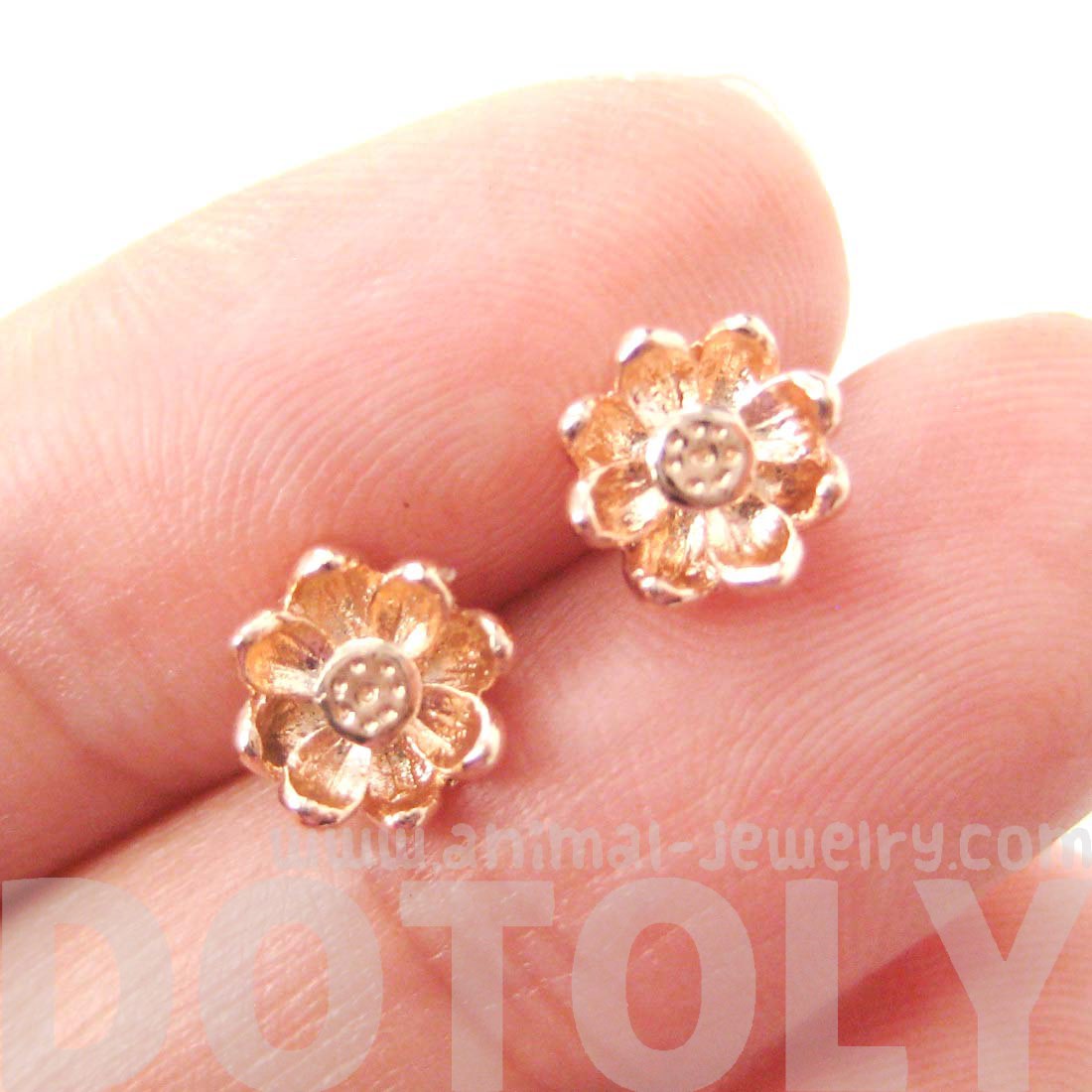 Textured Floral Flower Shaped Stud Earrings in Rose Gold · DOTOLY