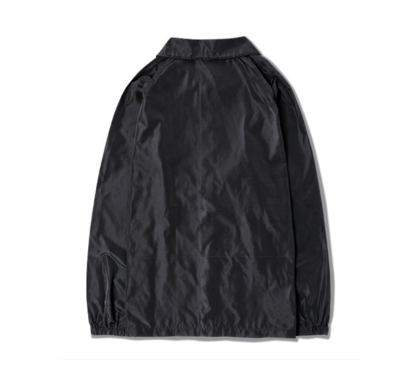 black windbreaker camping