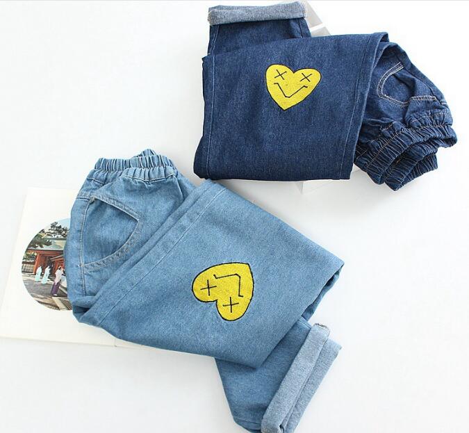 star embroidered jeans